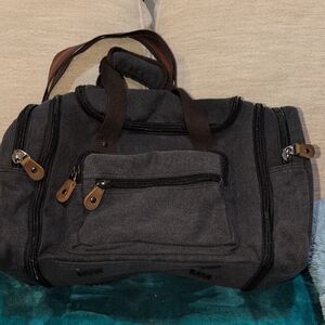 Black Expandable Canvas Duffel Bag With Shoulder Strap